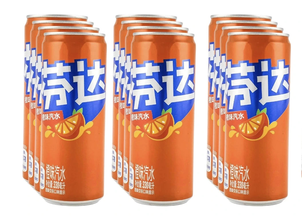 Multiple orange cans of Fanta with a brand logo on a white background