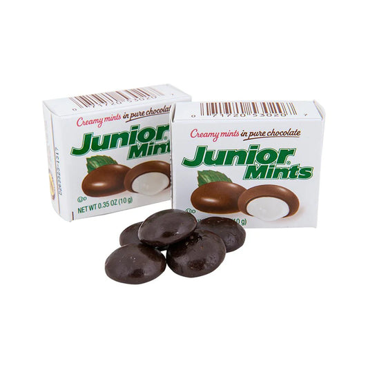 Two boxes of Junior Mints chocolate candies on a white background