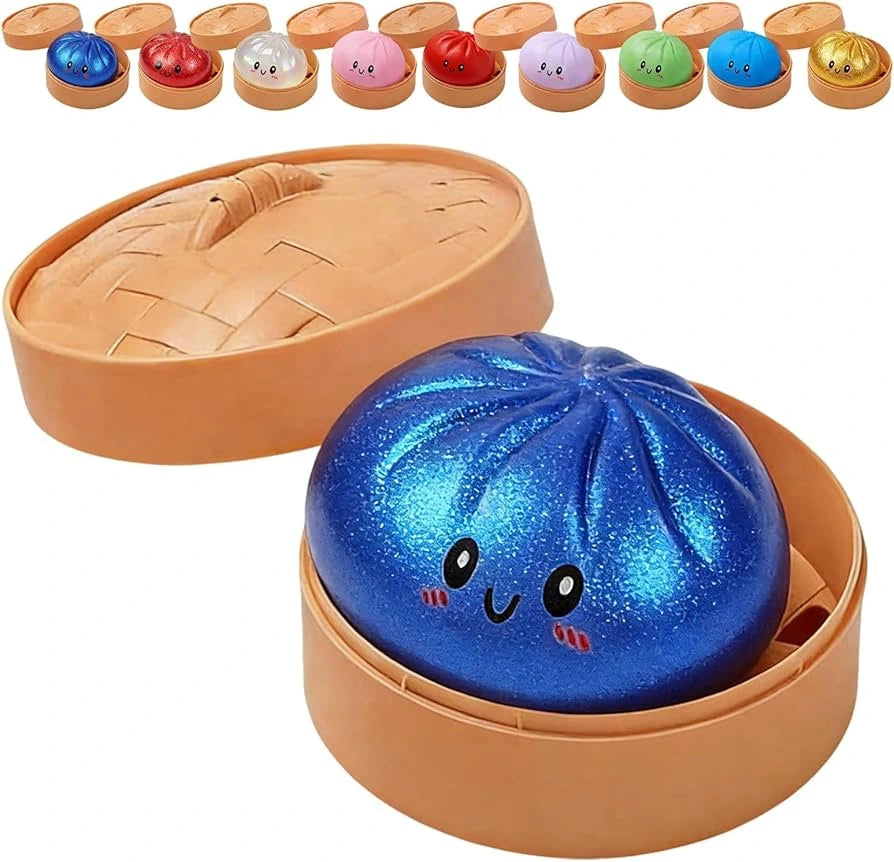 Blue glittery bun toy with a face in an open tan bun mold, surrounded by other bun toys.